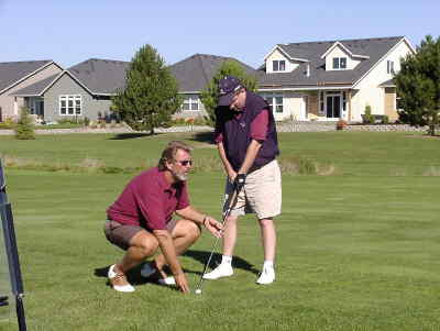Picture of Kevin adjusting the club for Bill